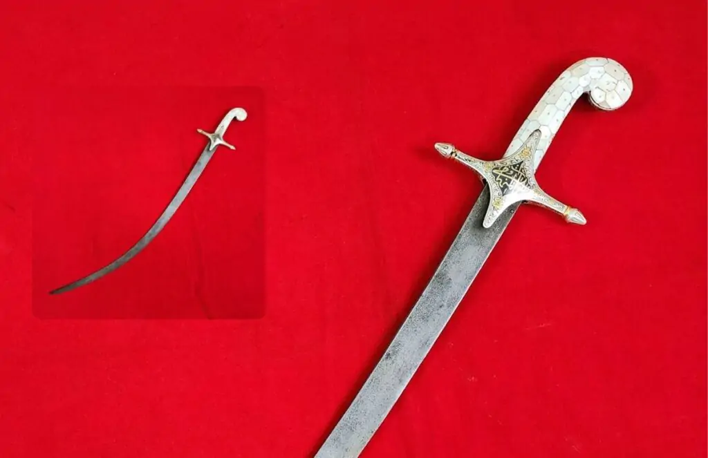 antique shamshir sword on the red carpet
